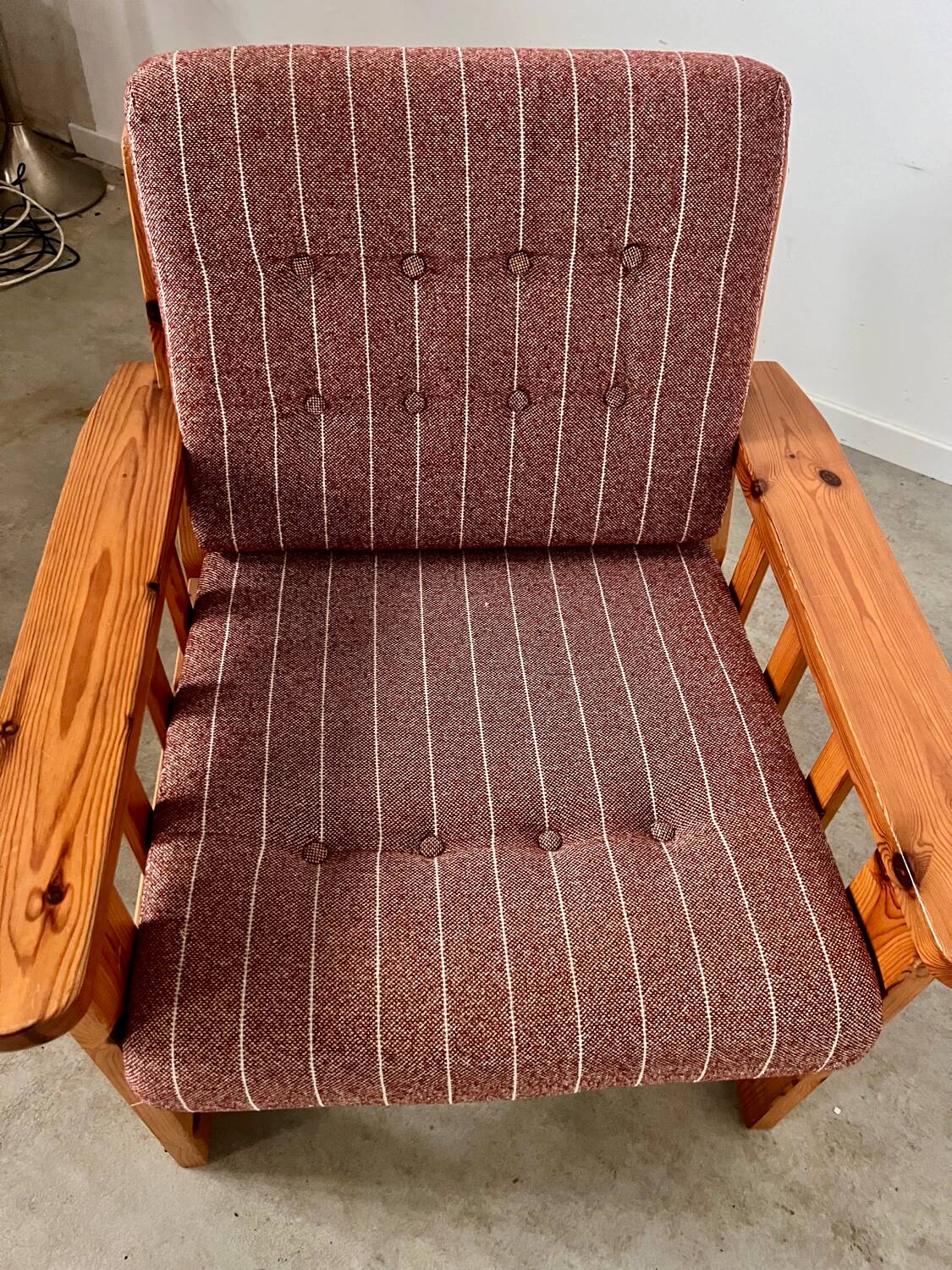 Old vintage Scandinavian design pine armchair from the 70s