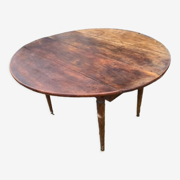 Table ronde en bois avec rallonges