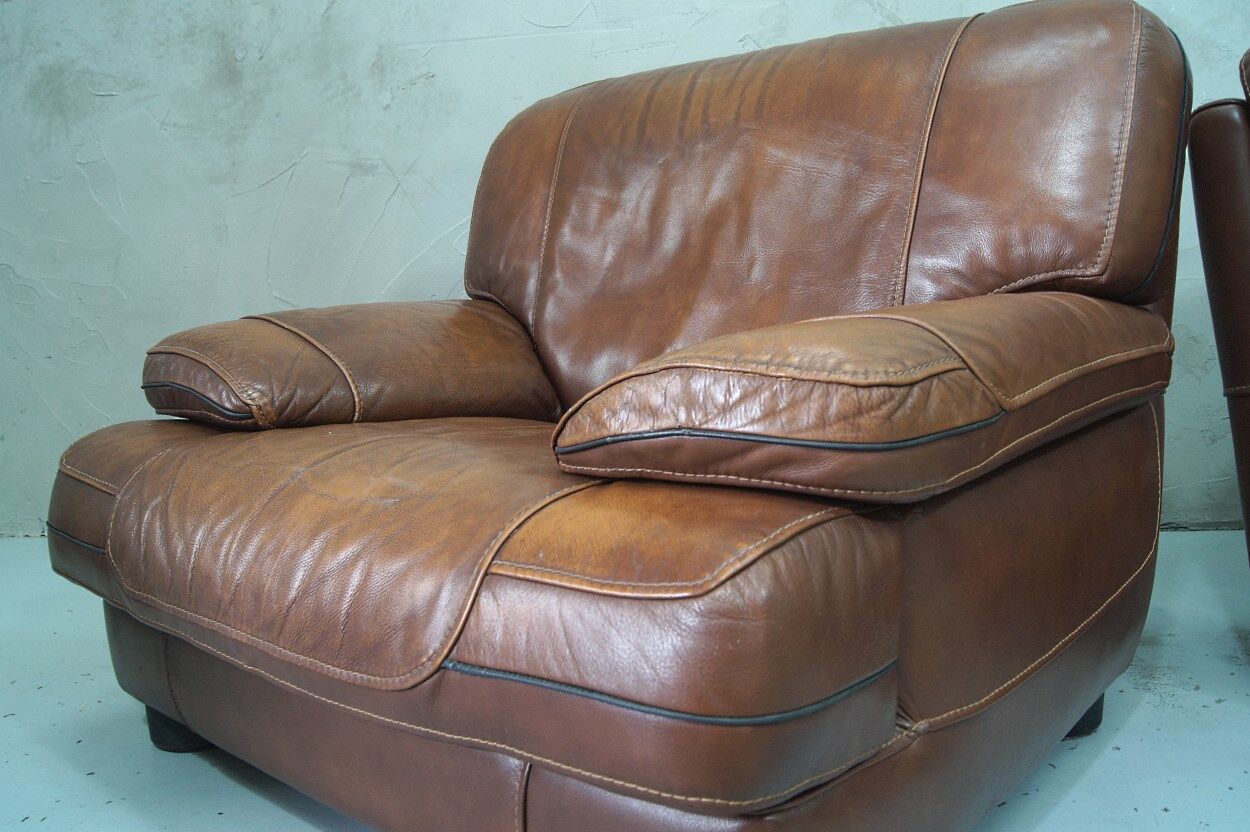 A pair of vintage Italian leather Lounge Chairs, 1970s