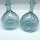 Deux carafes en verre soufflé Biot