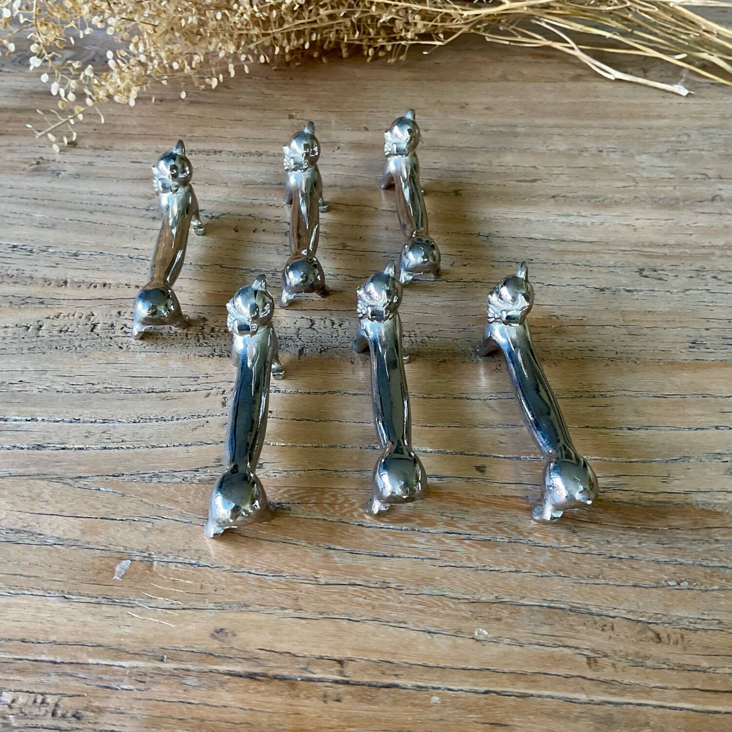 6 silver metal “cat” knife holders