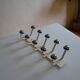 Vintage 1970s wall-mounted coat rack with 10 hooks