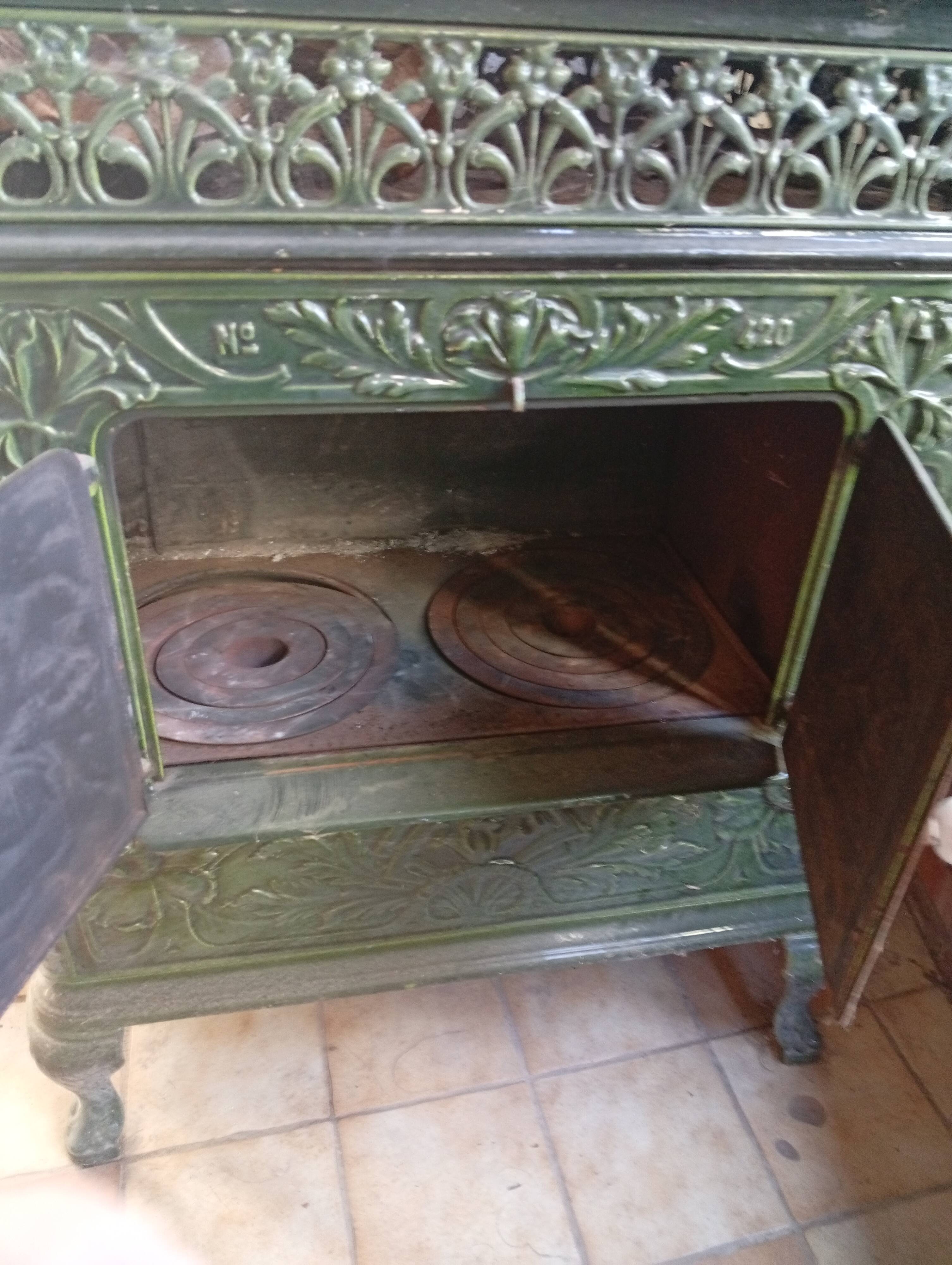 Old green enamelled cast iron pan