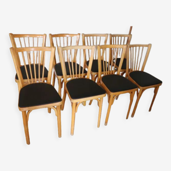 Série de 8 chaises Baumann n°12 skaï noir hêtre clair