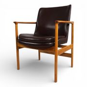 Fröscher leather armchair by Ib Kofod-Larsen, 1960