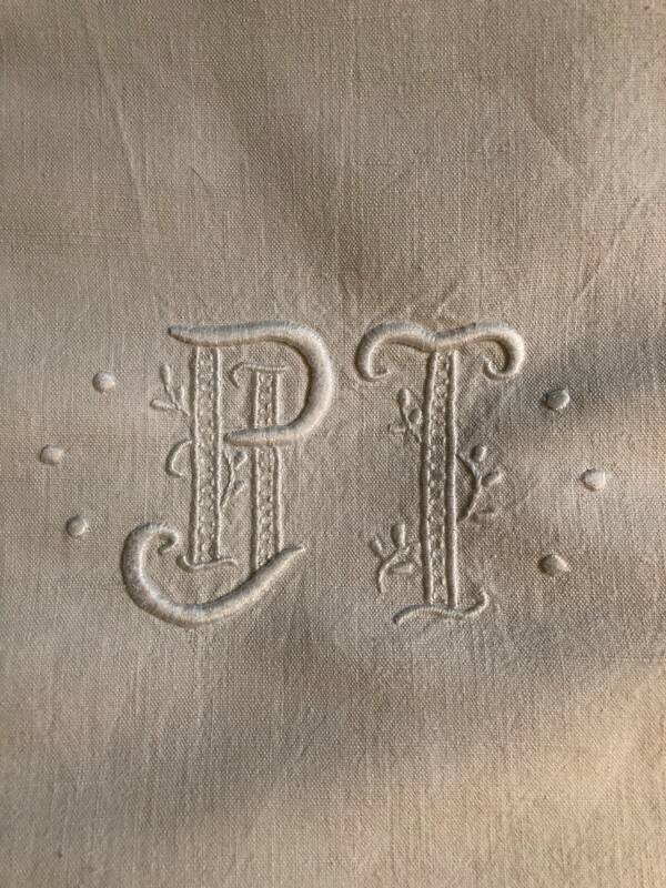 Antique embroidered linen-cotton sheet with monogram PJ T and Venice lace pattern