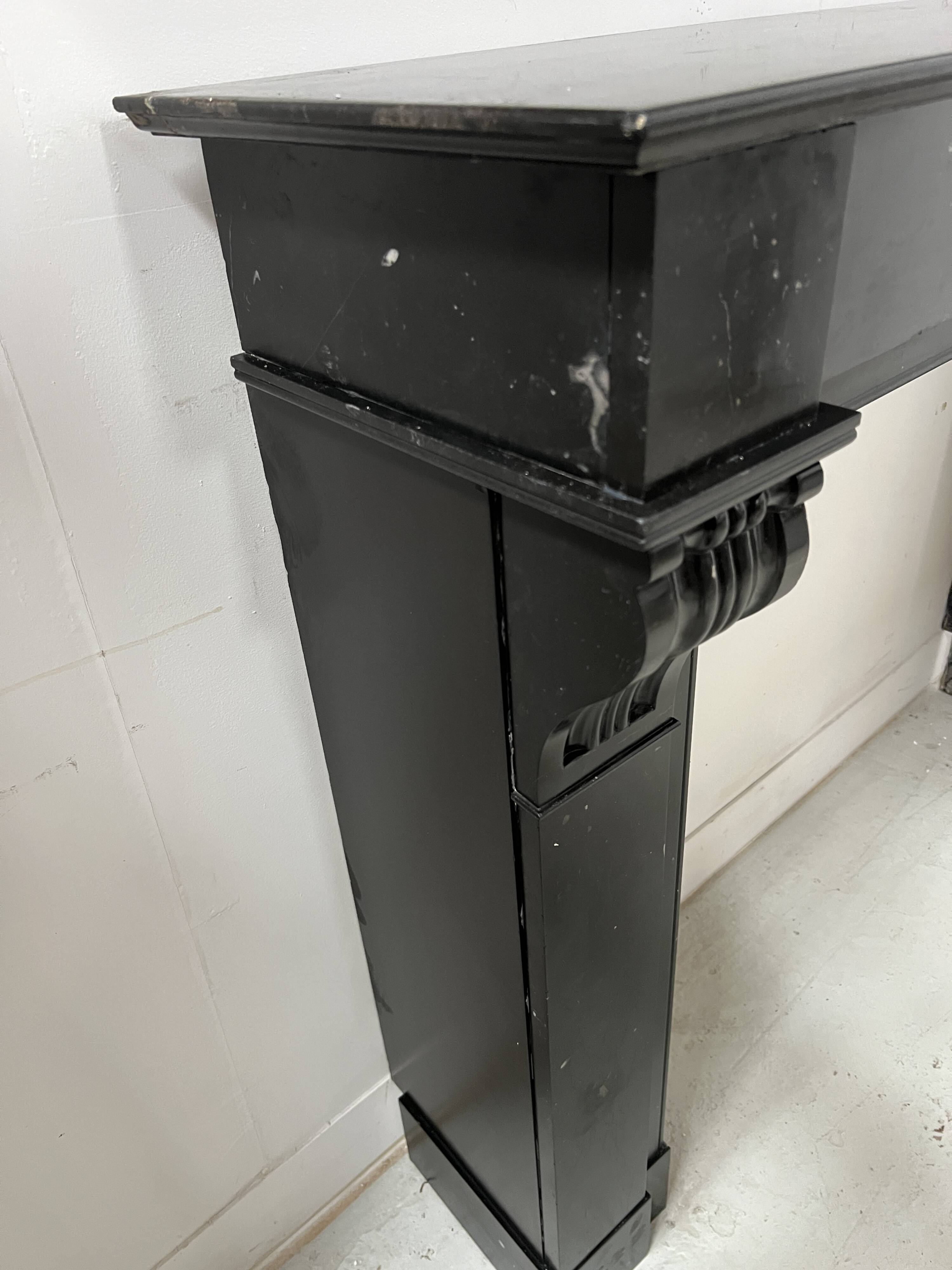 Napoleon III fireplace with a black marble corbel, 19th century.