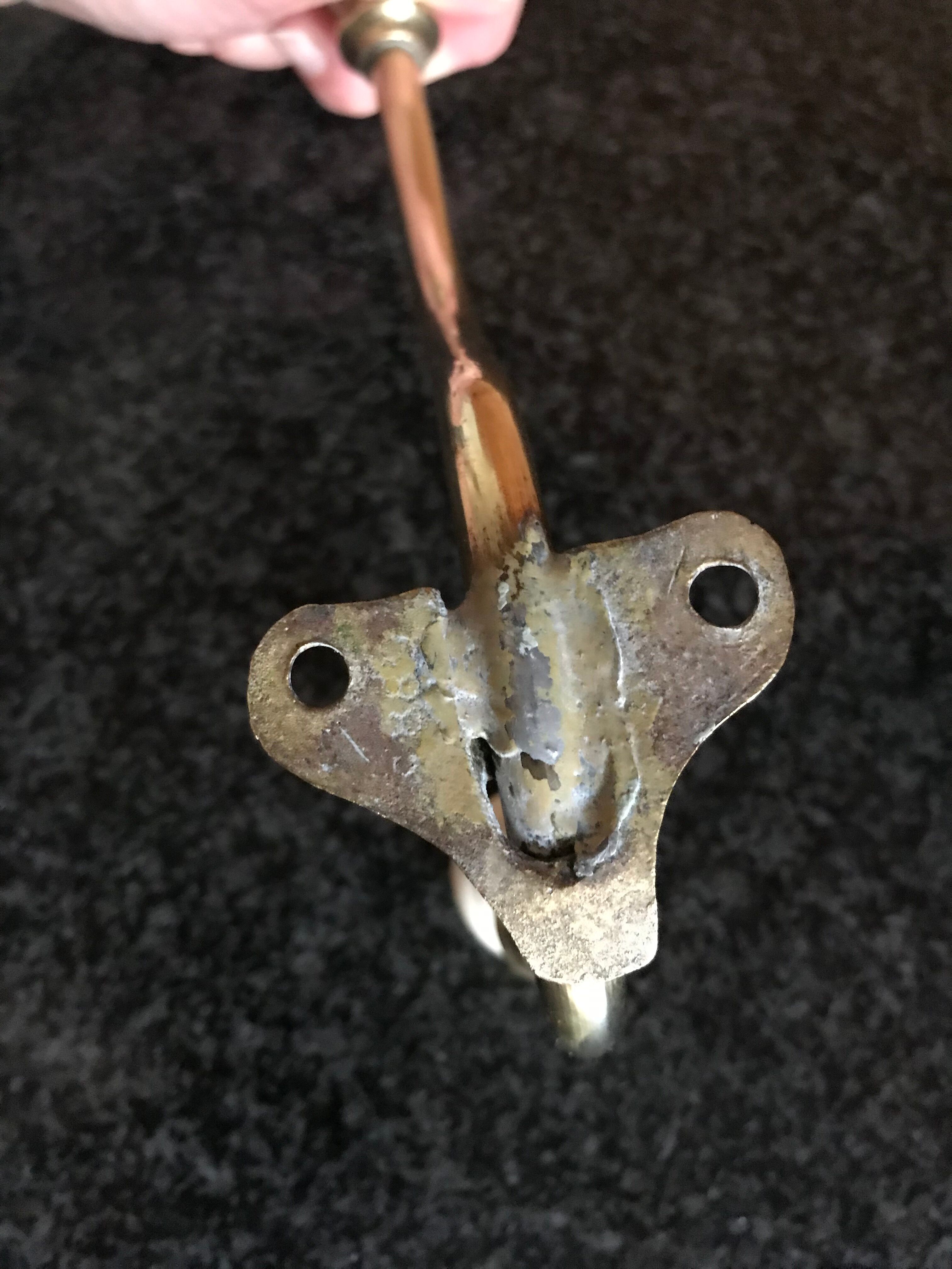 Brass and porcelain hook