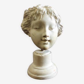 Plaster head of a young girl