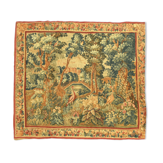 Printed green tapestry depicting birds in the park of a castle