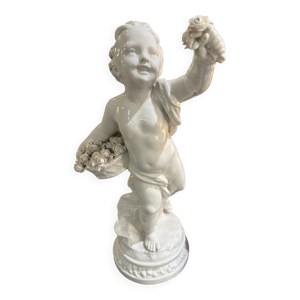 Statue enfant aux fleur
