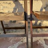 Three wooden folding chairs