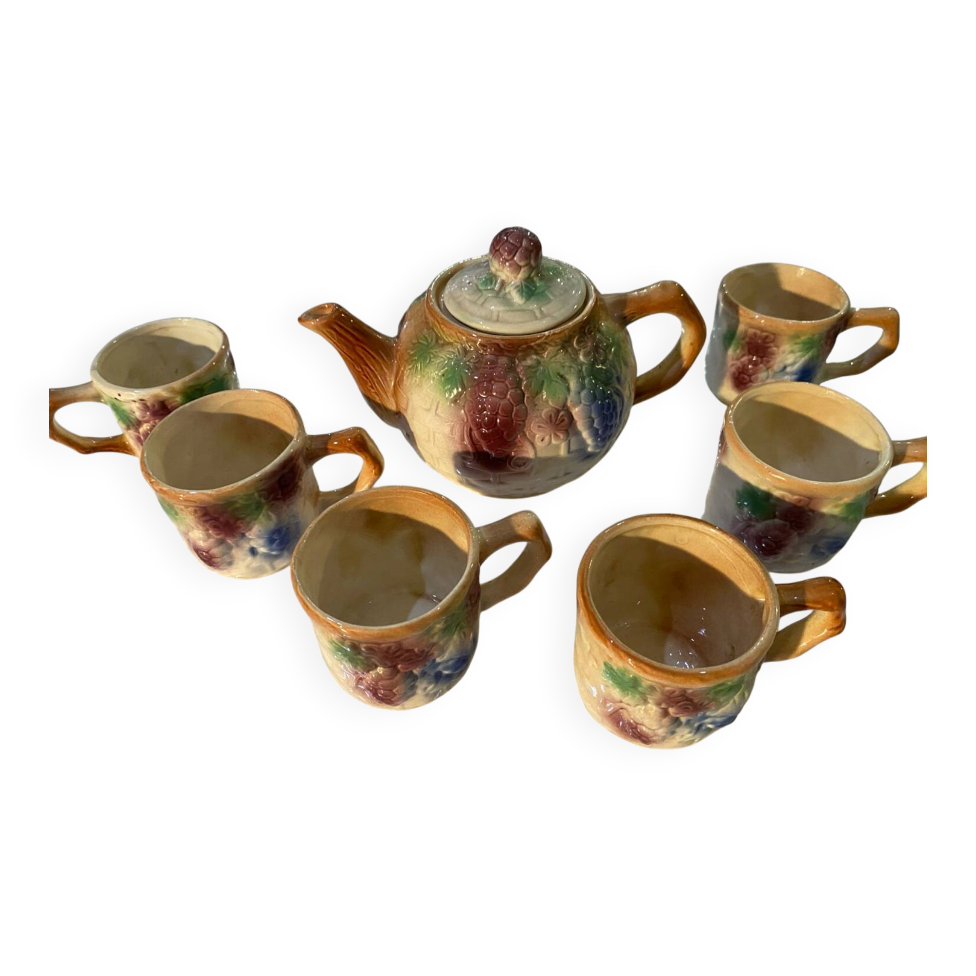 Vintage earthenware teapot and cup set