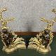 Pair of gilded bronze and patinated bronze andirons depicting putti circa 1850