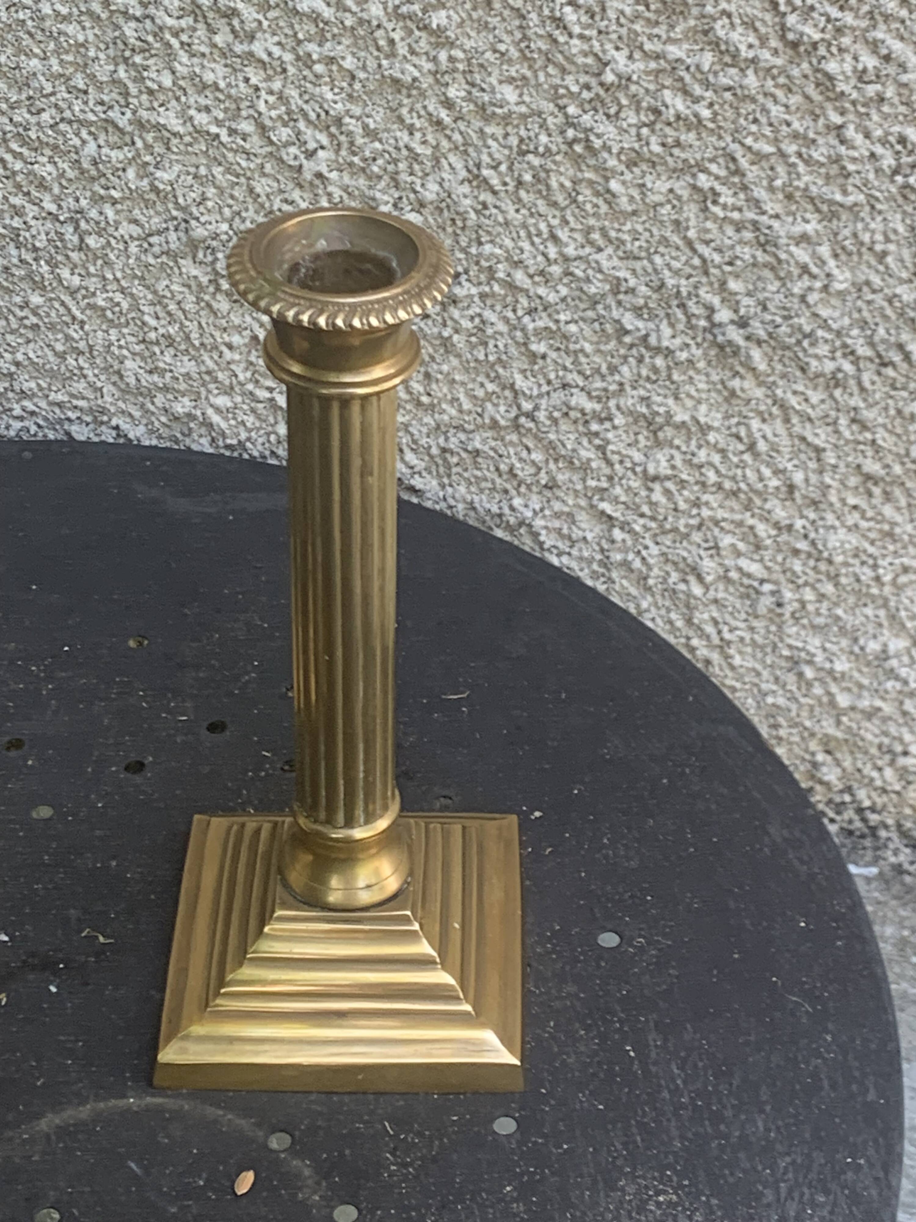 Pair of gilded brass candlesticks, vintage column shape