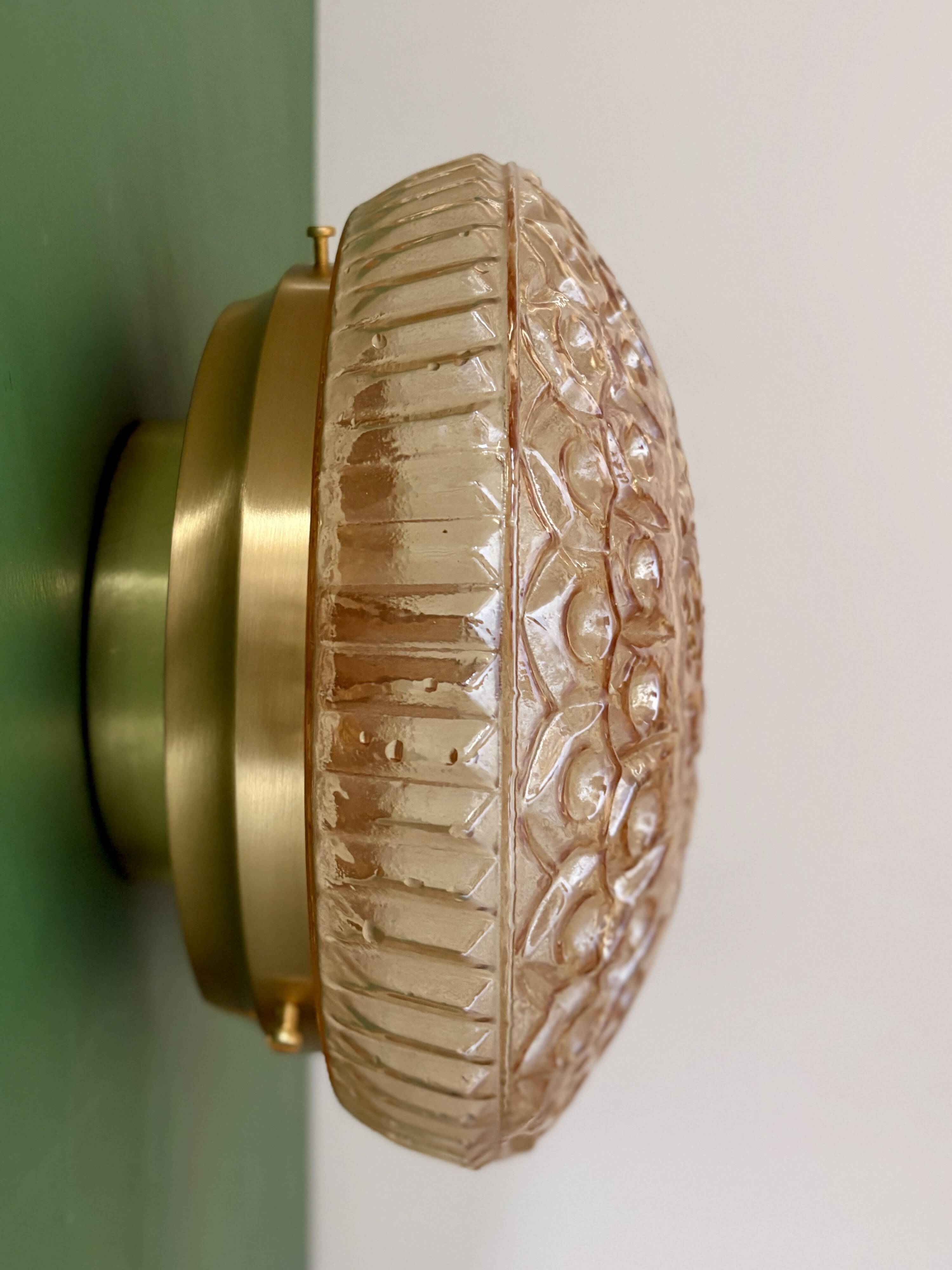 Vintage amber glass globe wall/ceiling light.