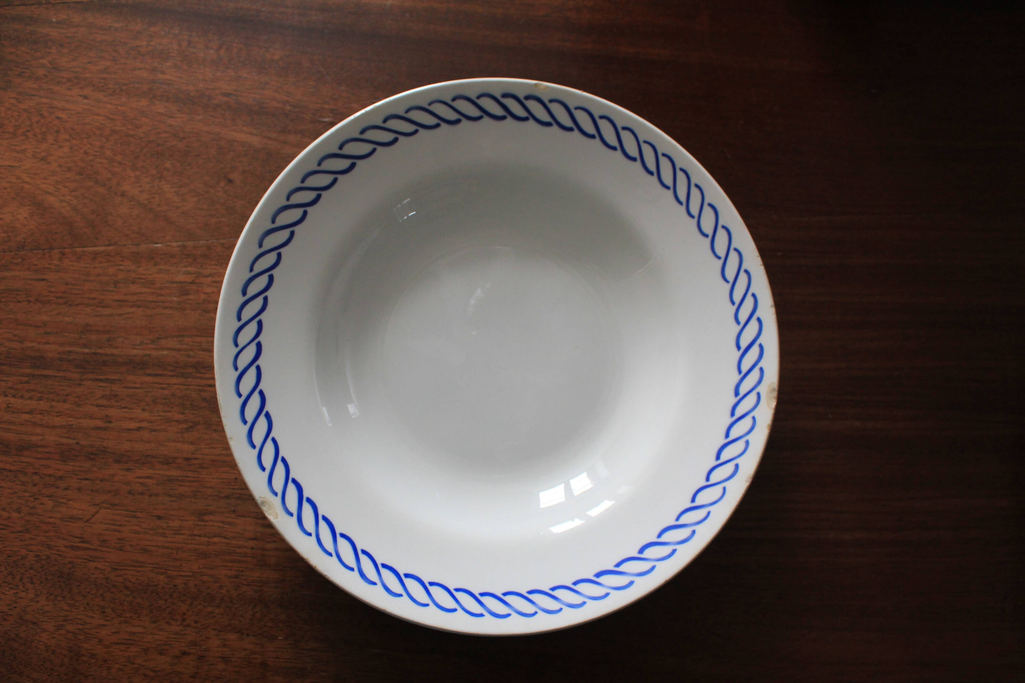 Deep plate with royal blue geometric pattern marked on the back FB 45.