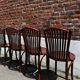 Lot of 4 vintage bistro chairs with slats in Thonet style.