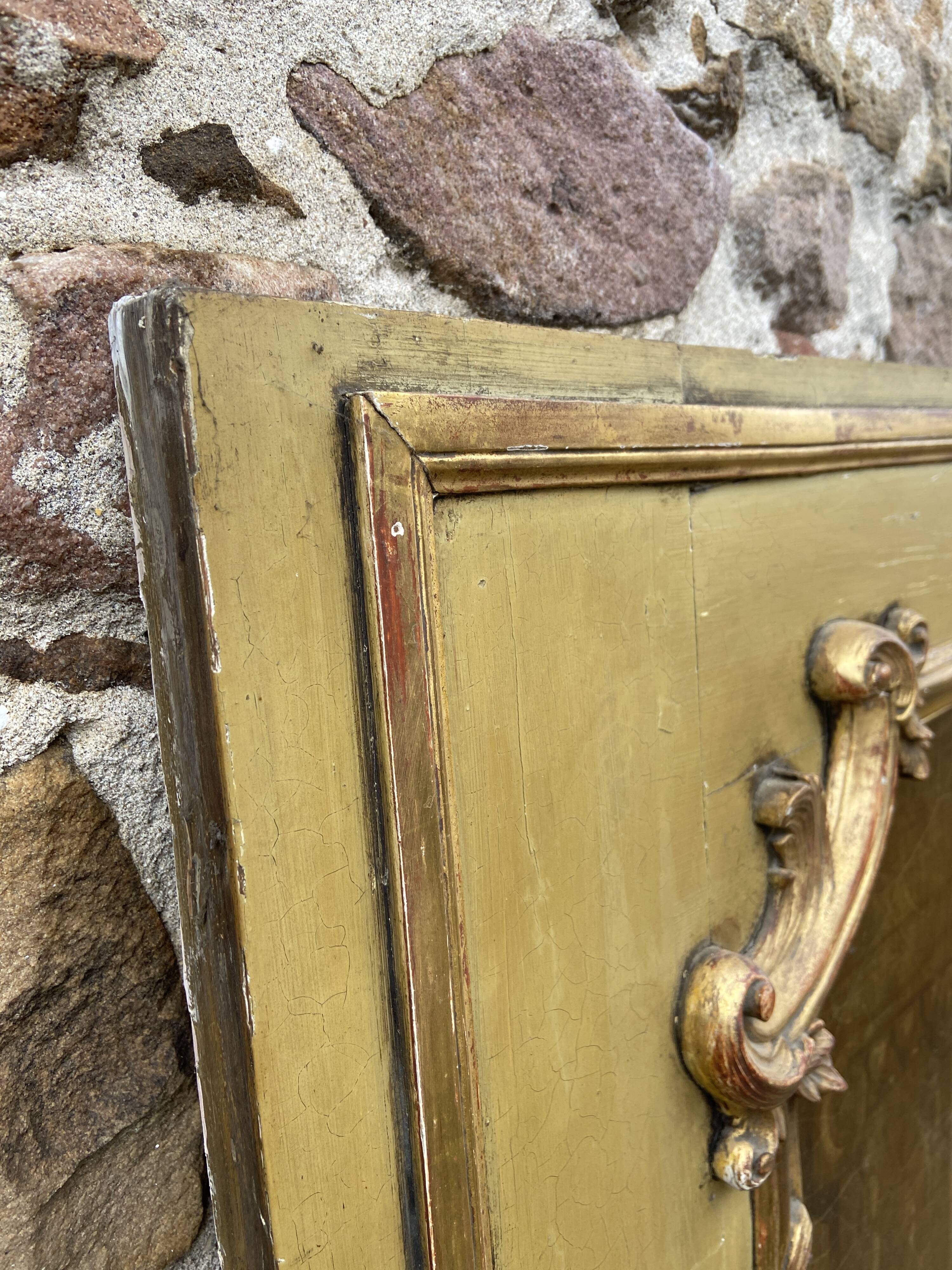 Trumeau & early 19th century painting in gilded wood.