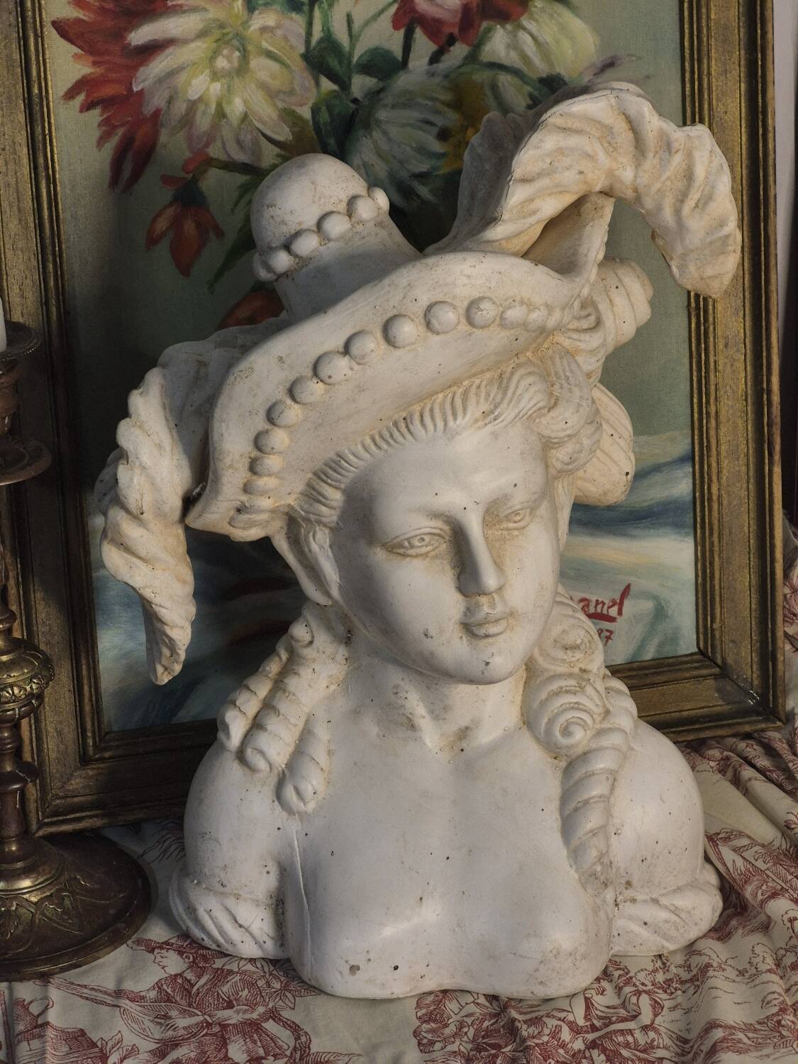Bust of a woman with a hat