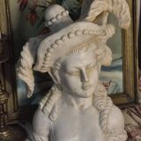 Bust of a woman with a hat