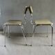 Pair of chairs in "wood" formica and gold edges, 1960s