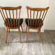2 chaises baumann assise en simili cuir noir