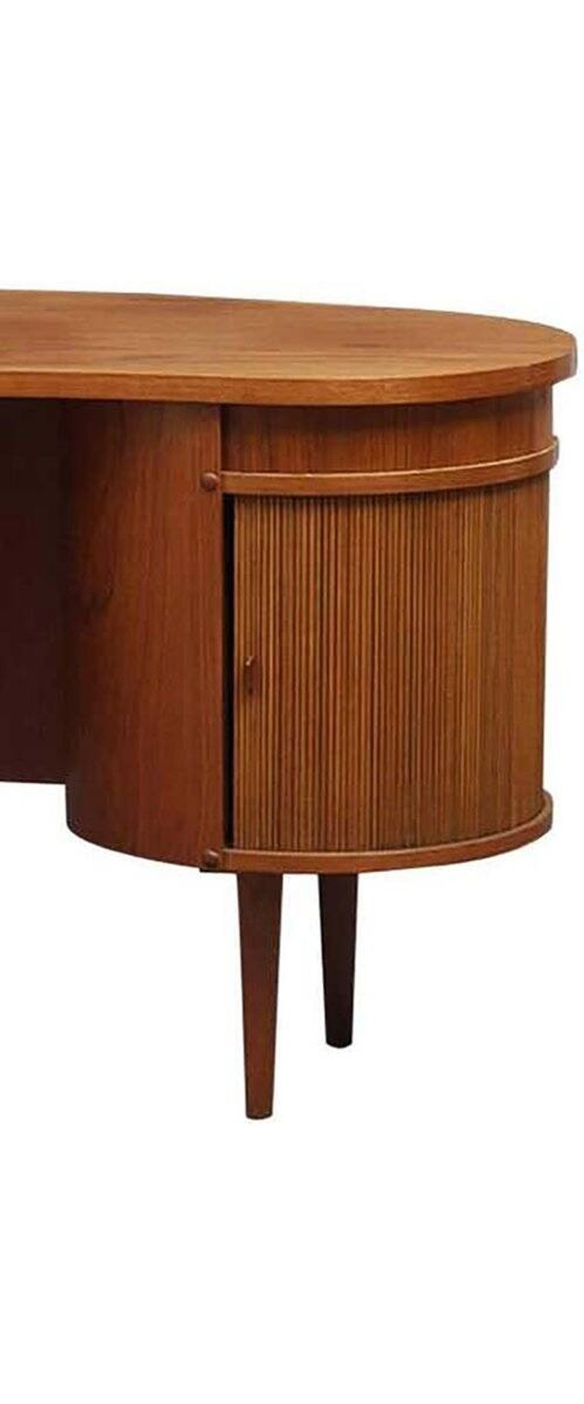 Danish teak kidney desk from the 1950s — organic shape and drum.