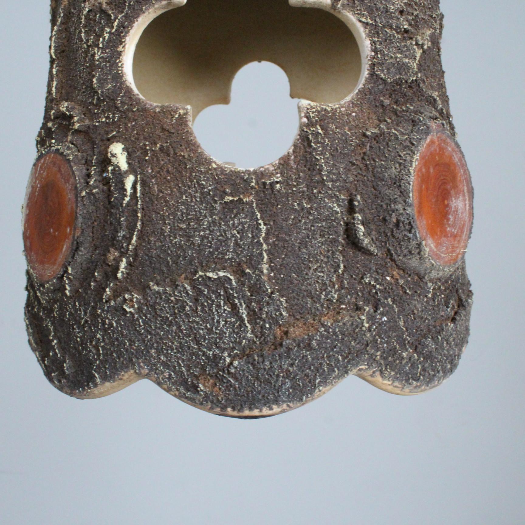 suspended lamp in brutalist ceramic France 1950
