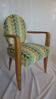 Office chair made of beech and green fabric