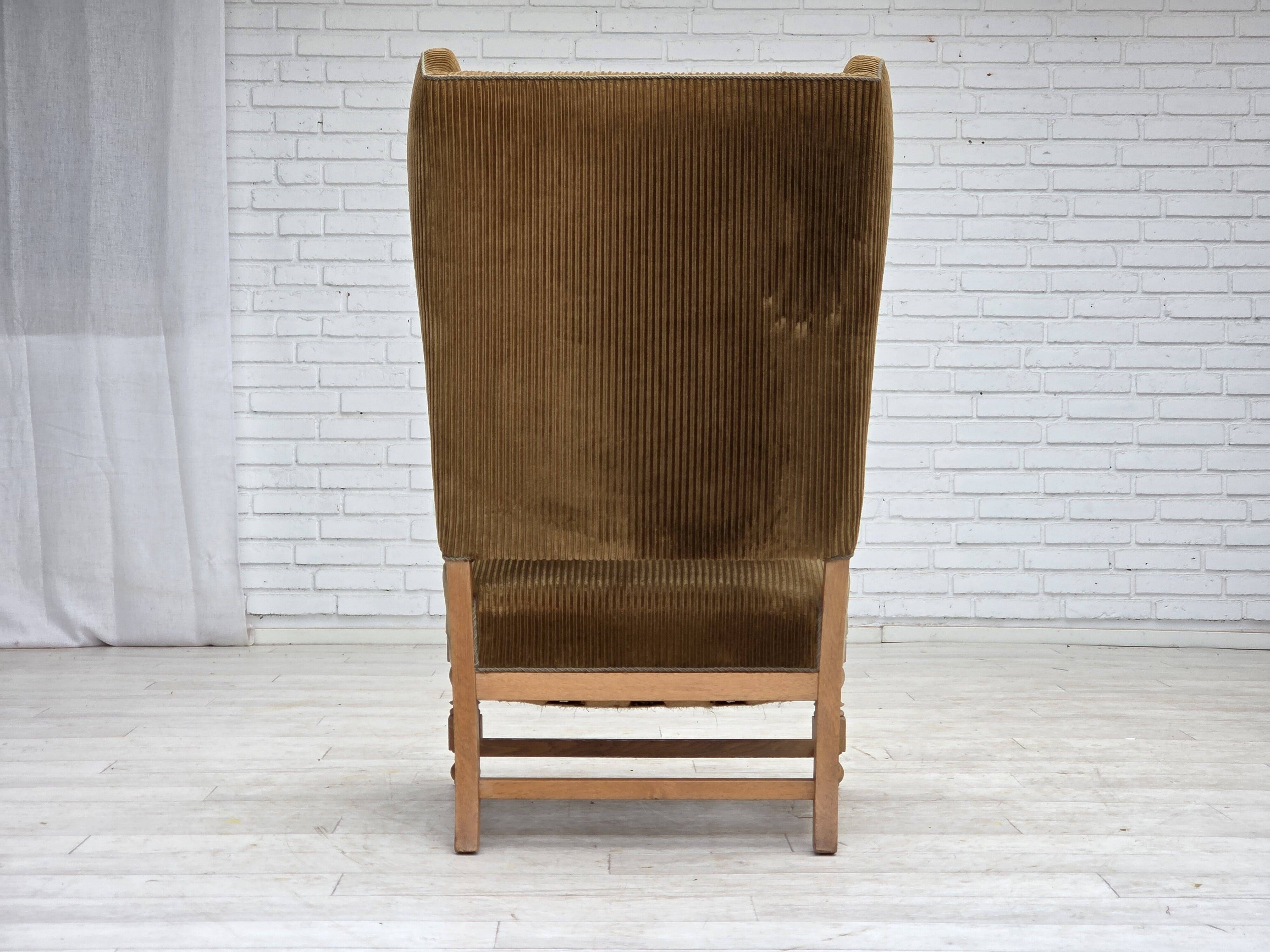 1970s, Scandinavian highback armchair, furniture corduroy, carved oak wood.