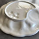 Vintage plate in ceramic enamelled decoration of fruits in relief