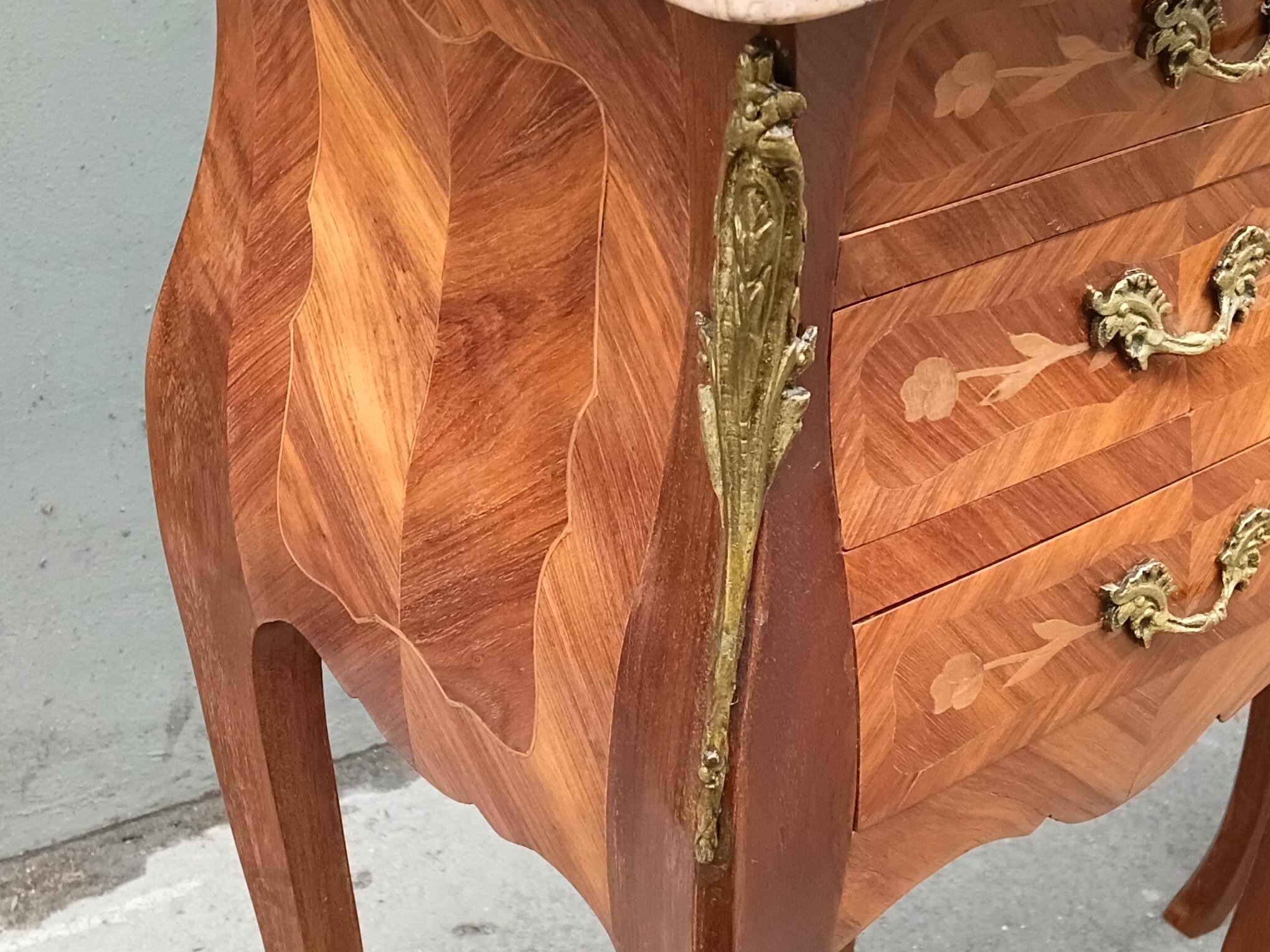 Pair of Louis XV style bedside tables in rosewood.
