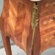 Pair of Louis XV style bedside tables in rosewood.