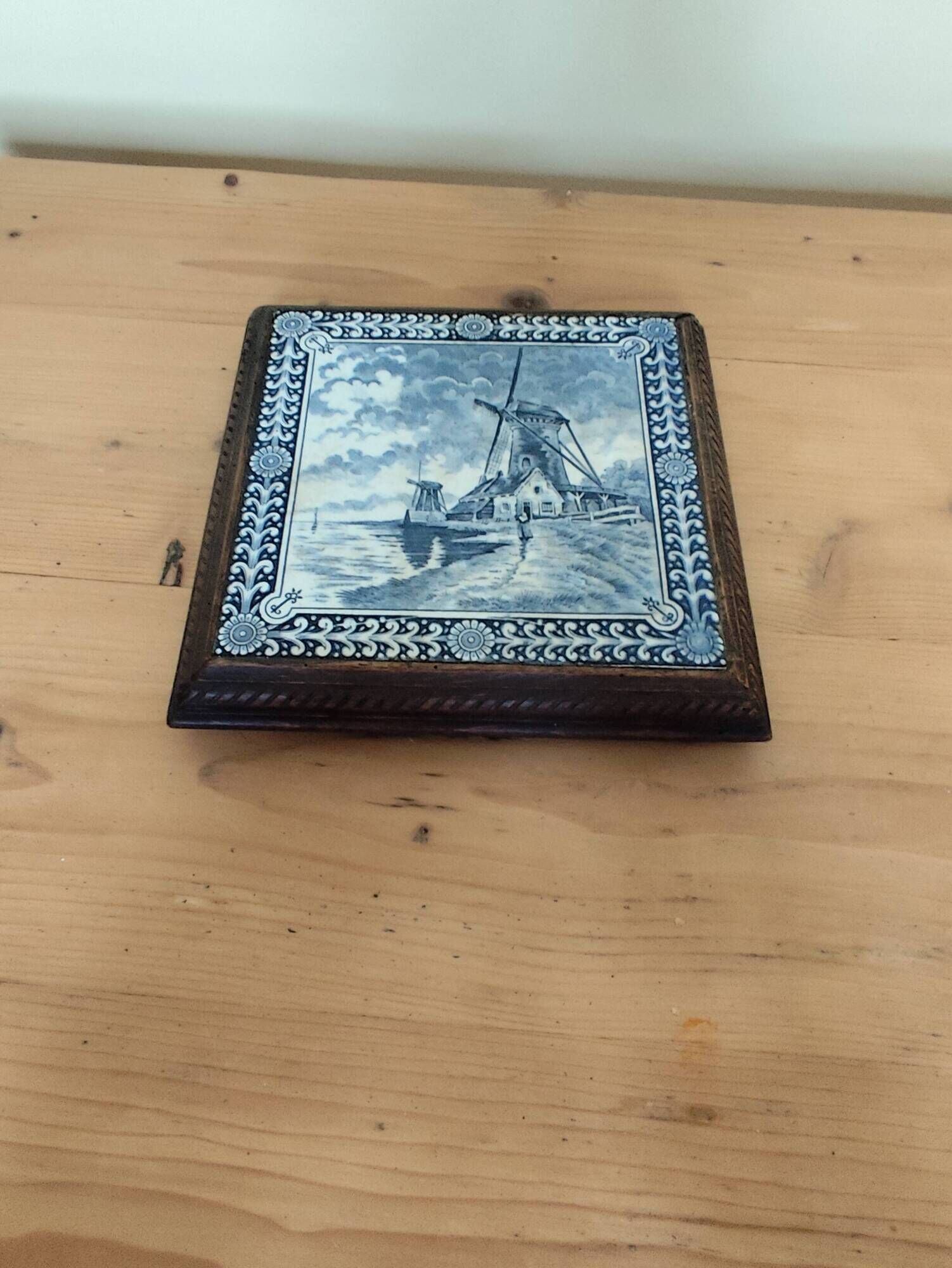 Ceramic tile trivet and wooden frame with Dutch windmill.
