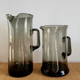Design jugs in smoked glass with pinched neck. around 1970