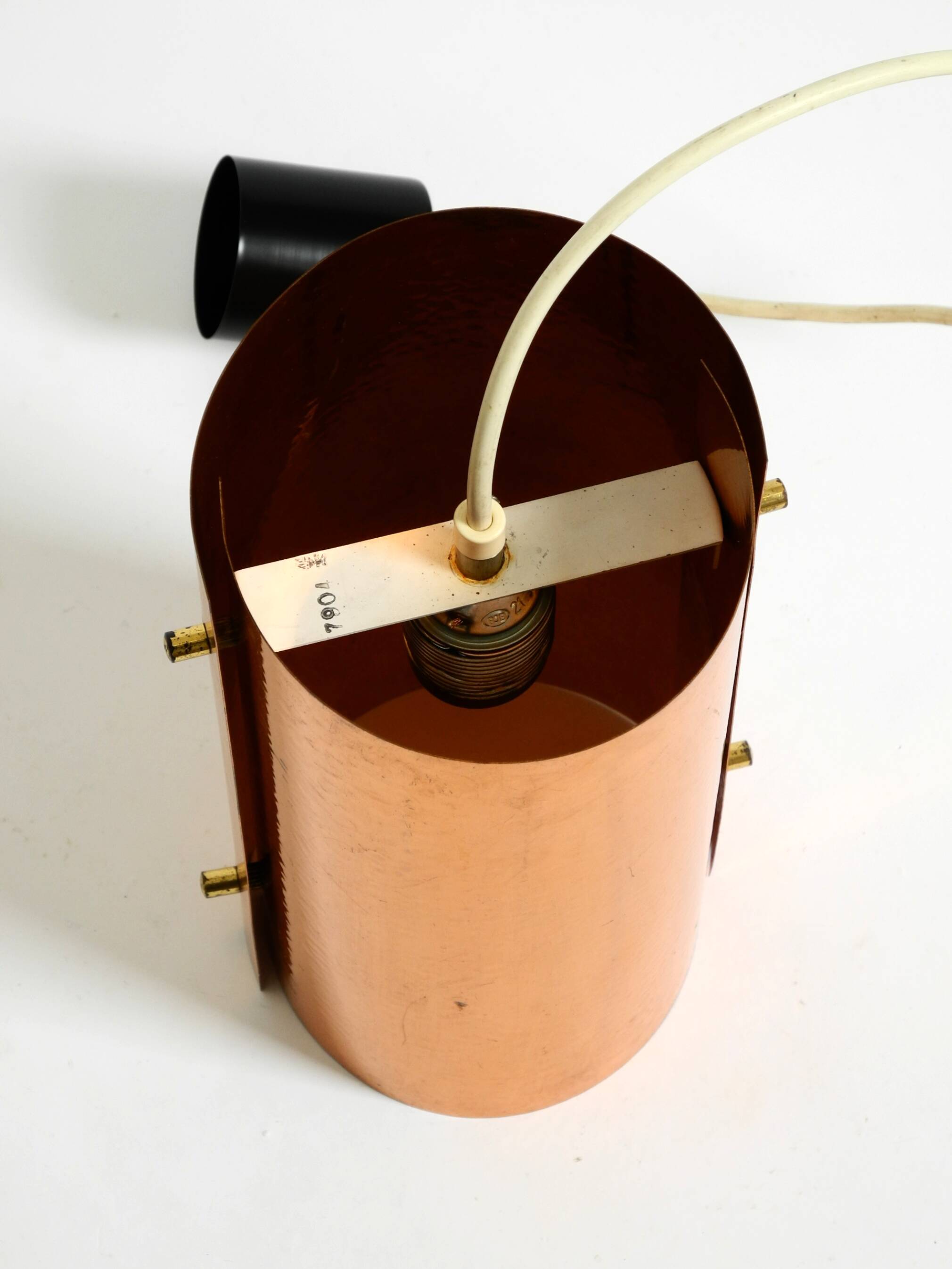 Two 50s tube pendant lamps consisting of two screwed-together copper bowls