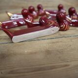 10 ceramic knife holders in burgundy duck with gold edging