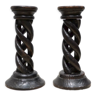 Pair of antique turned wooden candle holders