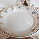 Eight Villeroy & Boch dessert plates with gold decor