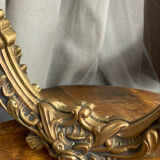 Rococo style mirror in wood and gilded stucco