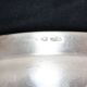 Flat oval silver metal