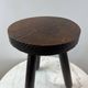 Tripod stool in turned, patinated wood