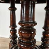 Coffee table in walnut with maple inlays and wheels