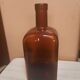 Bouteille en verre ambrée