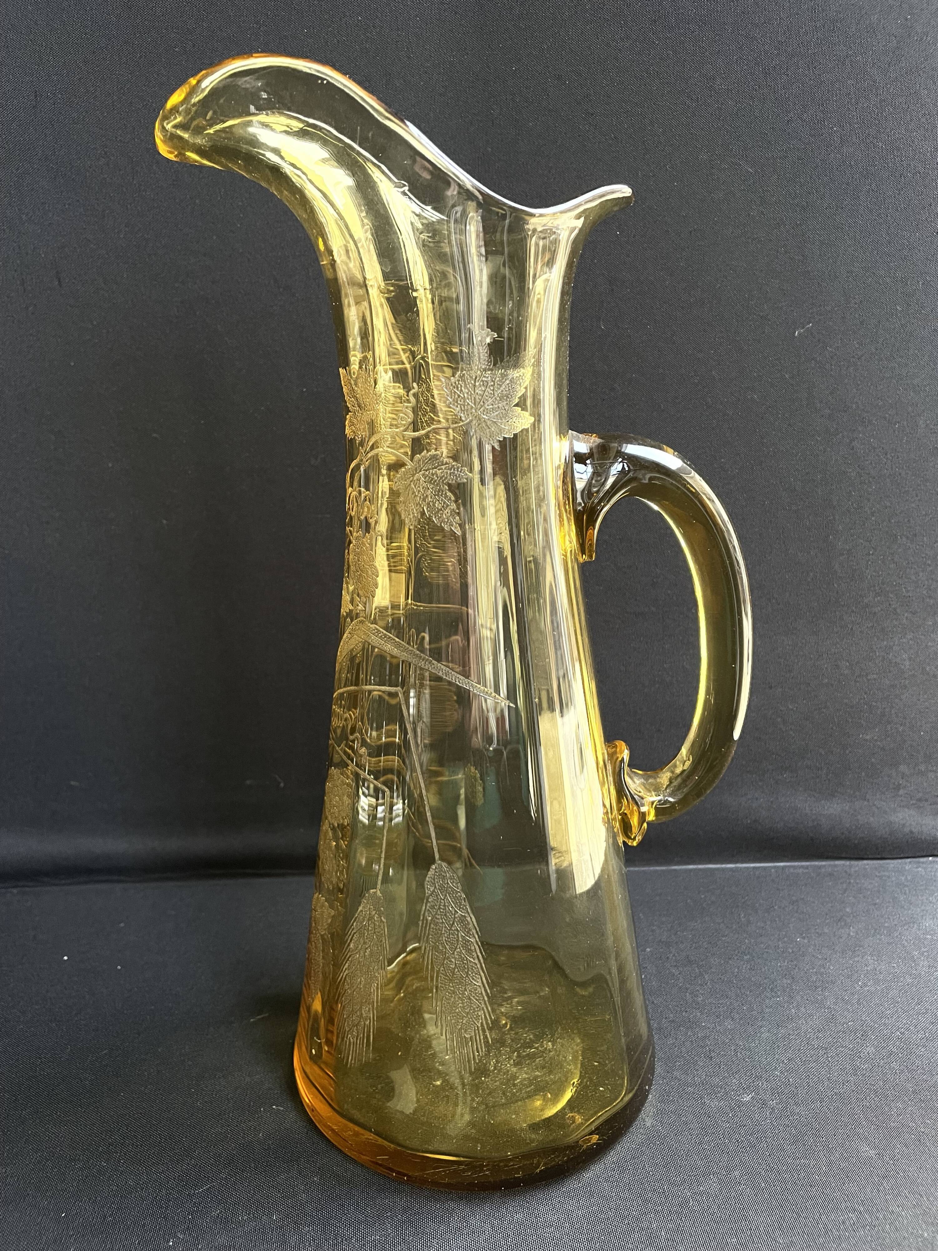 Beer pitcher (can) in engraved ambrino blown glass