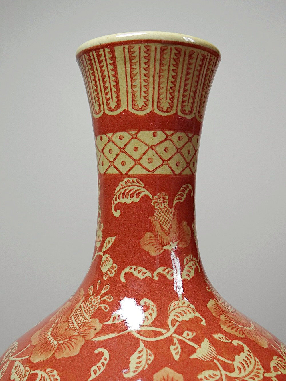 20th century Chinese vase, hand-painted ceramic in an unusual red hue.