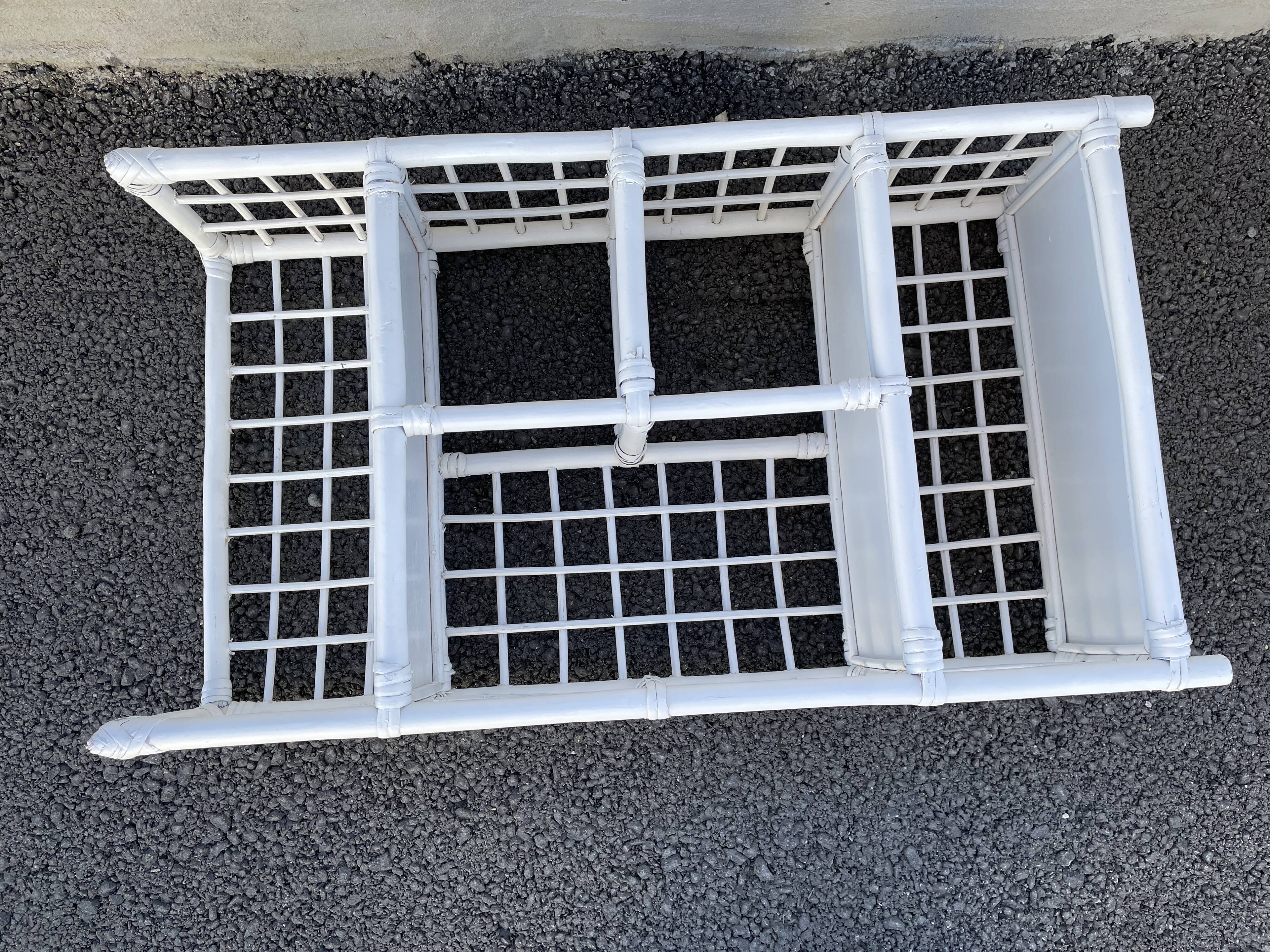 White rattan shelf with braces