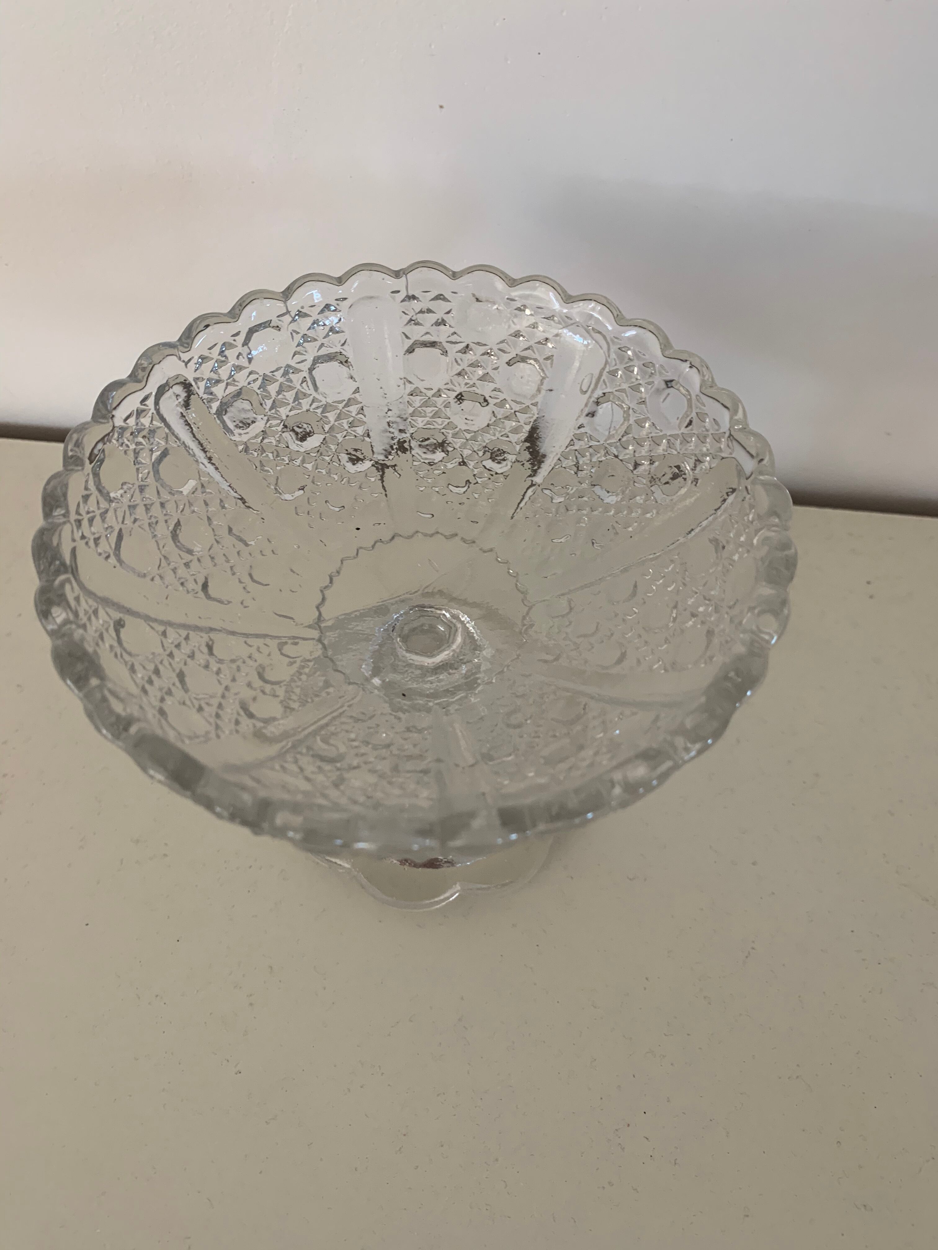 Two dredged cups in transparent glass geometric patterns in old relief