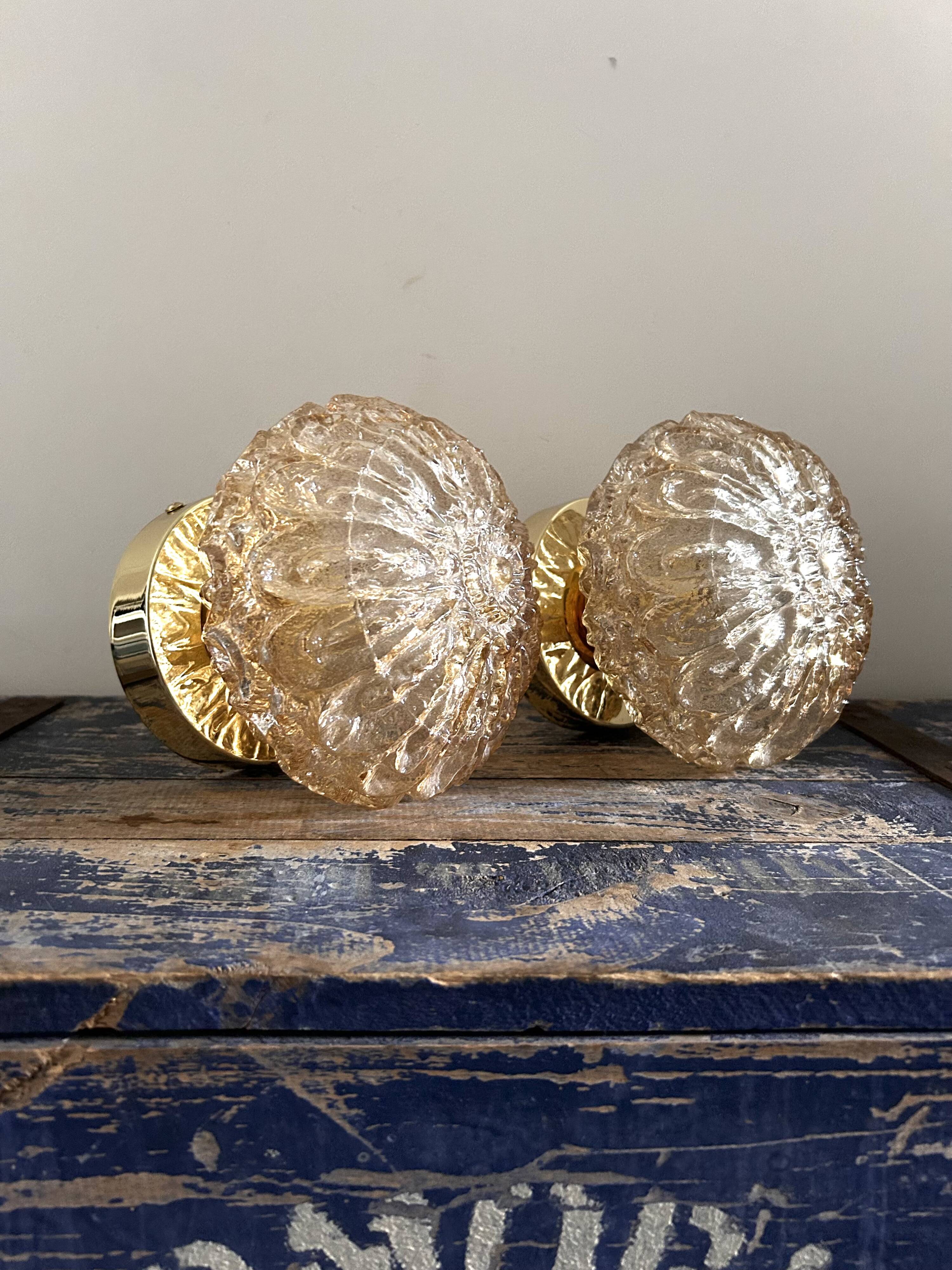 Set of two vintage amber glass wall lights